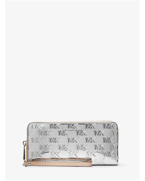 michael kors geldbeutel logo|Jet Set Travel Metallic Logo Embossed Continental Wallet.